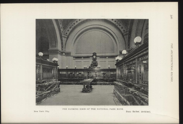 Schwarze und weiße Fotografie des Bankettsaals der National Park Bank in New York City, mit Tischen, Lampen, einer Wanduhr und Text am unteren Rand.
