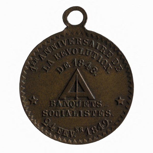 Bronze-Medaille mit 'Banquets Socialistes' eingraviert vor weißem Hintergrund.