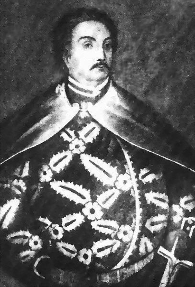 Schwarzes und weißes Foto von Papst Johannes Paul II. in Priesterrobe mit gefalteten Händen, strenger Miene und direktem Blick.