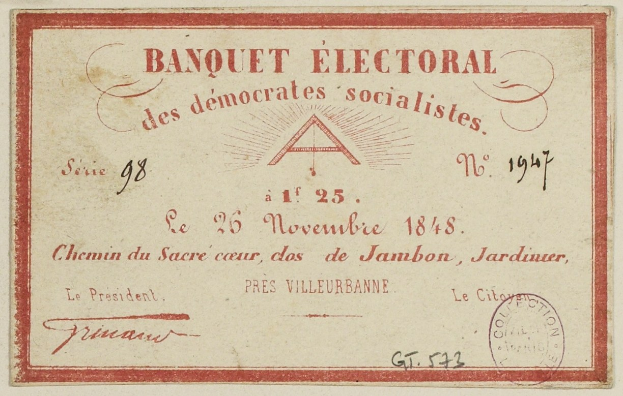 Alter Umschlag mit rotem Rand, der einen Stempel und den Text 'Banquet Electoral des Democrats Socialists' zeigt.
