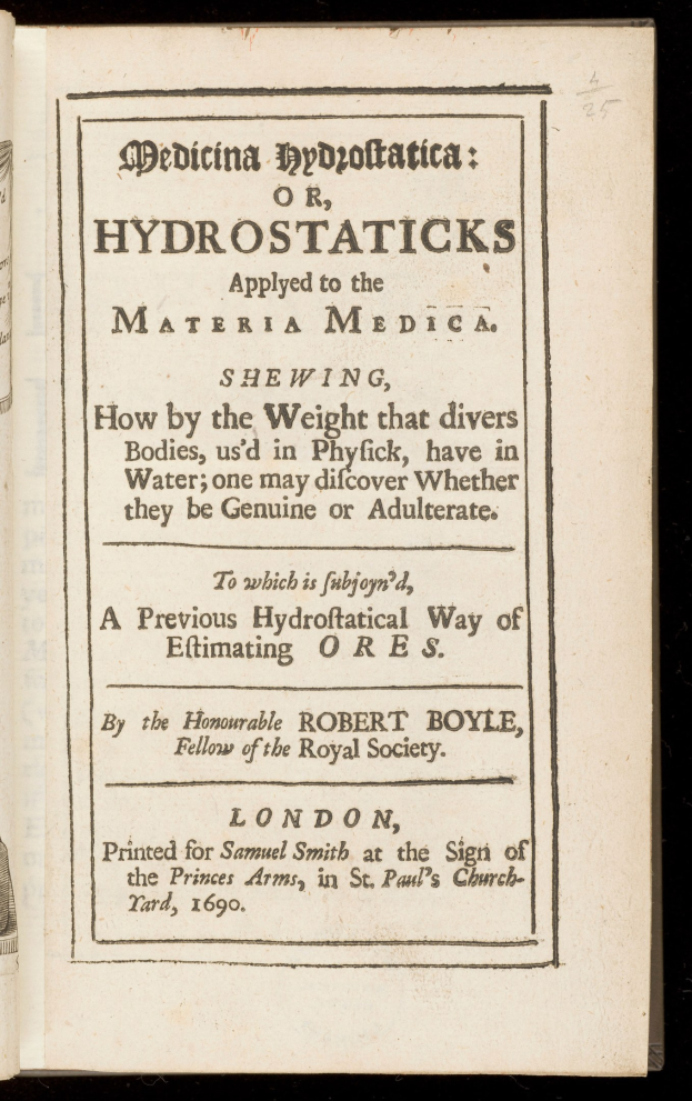 Offenes Buch mit schwarzem Hintergrund und weißer Seite, die den Titel "Medicina Hydrostatica oder Hydrostaticks Applied to the Material Medicine" anzeigt.