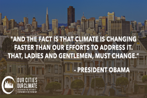 Eine Stadtansicht mit Gebäuden, Bäumen und Fahrzeugen, die einen Zitat von Präsident Obama zum Klimawandel in den Vordergrund stellt, unter einem sichtbaren Himmel.