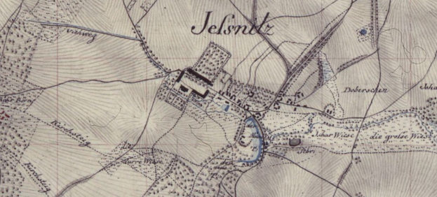 Detailiertes altes Stadtplan von Jelsnitz, Deutschland, mit einem Gebäude in der Mitte und umgeben von Text und Straßenlayout.